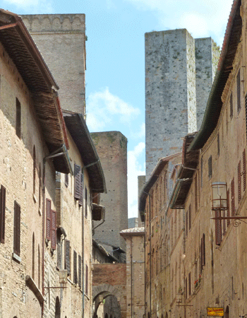 The Medieval towers of San Gimignano give an impression of how the Ponte Vecchio of Florence was once defended by similar huge towers.